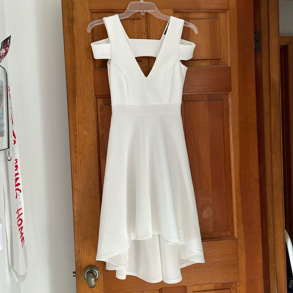 Boohoo Night Size Us 4, UK 8. Color is white with high low bottom hemline.